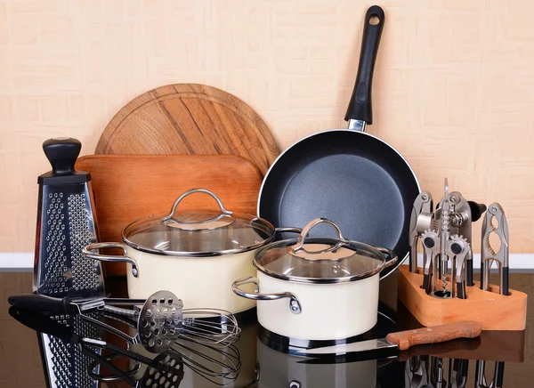 Kitchen tools on table in kitchen — Stock Photo, Image