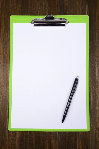 Clipboard on wooden background — Stock Photo, Image