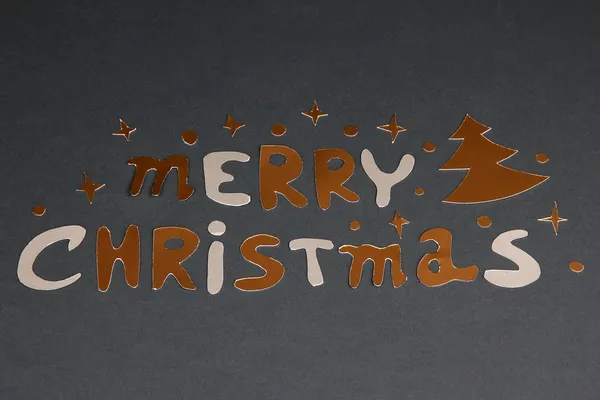 Merry christmas bokstäver på grå bakgrund — Stockfoto