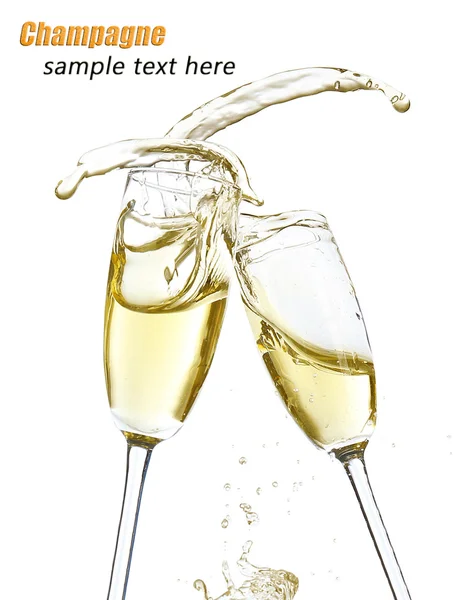 Glazen en een fles champagne op lichte achtergrond — Stockfoto