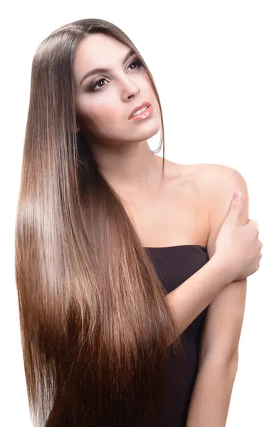 Bella giovane donna con i capelli lunghi isolati su bianco — Foto Stock