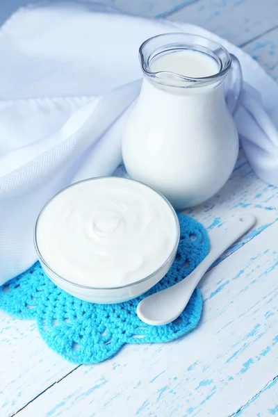 Dairy products on wooden table background — Stock Photo, Image