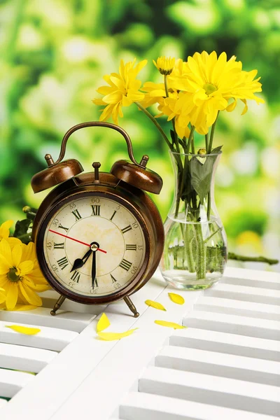 Digital alarm clock on table, on nature background — Stock Photo, Image