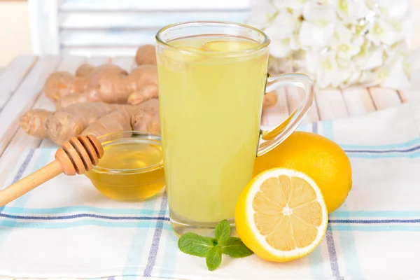 Healthy ginger tea with lemon and honey on table close-up — Stock Photo, Image