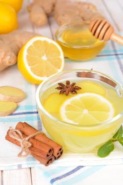 Healthy ginger tea with lemon and honey on table close-up — Stock Photo, Image