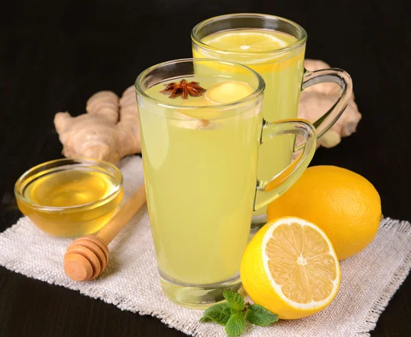 Healthy ginger tea with lemon and honey on table close-up — Stock Photo, Image