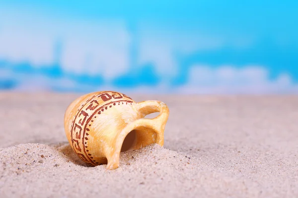 Greek ceramic amphora on sand, close up — Stock Photo, Image