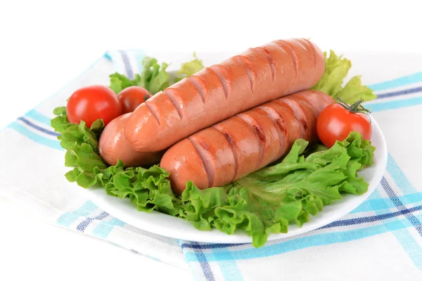 Grilled sausage on plate on table close-up — Zdjęcie stockowe