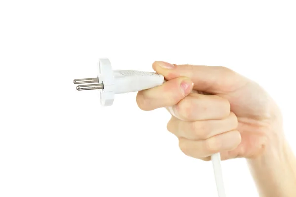 Mão segurando plugue elétrico isolado no branco — Fotografia de Stock