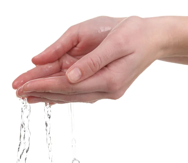 Manos humanas con agua salpicando sobre ellas aisladas en blanco — Foto de Stock