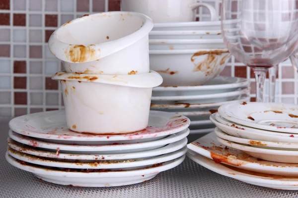 Dirty dishes on bright background — Stock Photo, Image