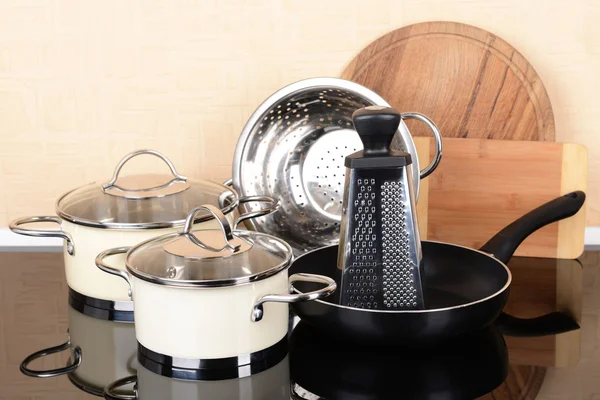 Kitchen tools on table in kitchen — Stock Photo, Image