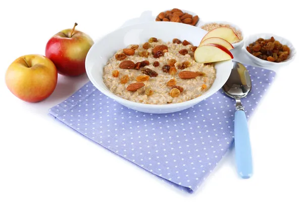 Smakelijke havermout met rozijnen en appels geïsoleerd op wit — Stockfoto