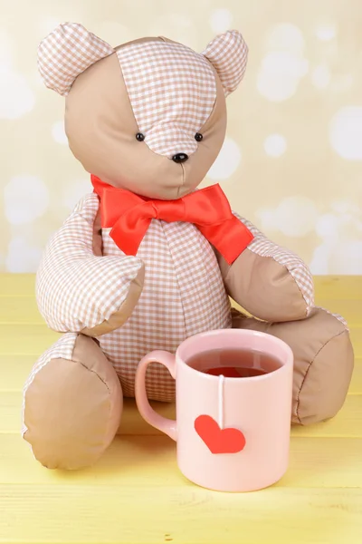 Bear toy on table on light background — Stock Photo, Image