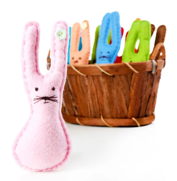 Funny handmade Easter rabbits in basket, isolated on white — Stock Photo, Image