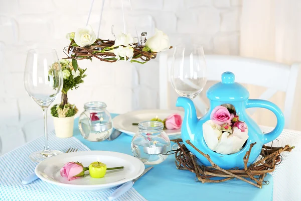 Beautiful holiday Easter table setting in blue tones, on light background — Stock Photo, Image