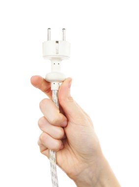 Elektrik fişi üzerinde beyaz izole tutmak el 