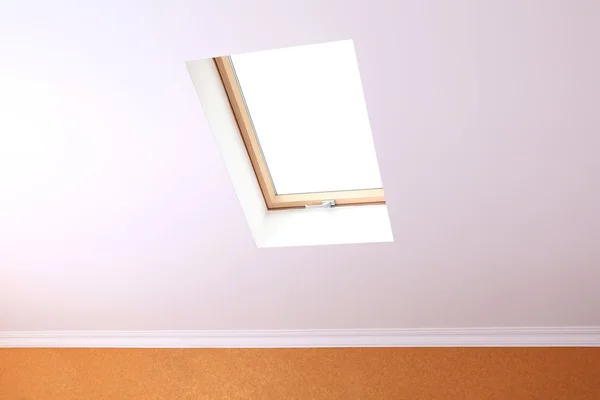 Roof skylight in new modern attic room — Stock Photo, Image