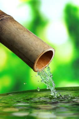Spa parlak arka plan bambu çeşme ile natürmort