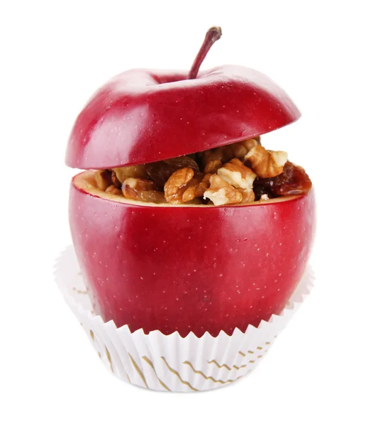 Jablko s rozinkami a ořechy izolovaných na bílém — Stock fotografie