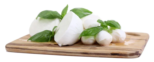 Tasty mozzarella with basil on wooden board isolated on white — Stock Photo, Image