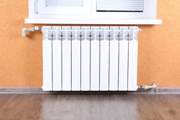 Heating radiator in room — Stock Photo, Image