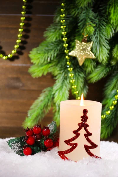 Burning candle on wooden background Royalty Free Stock Photos