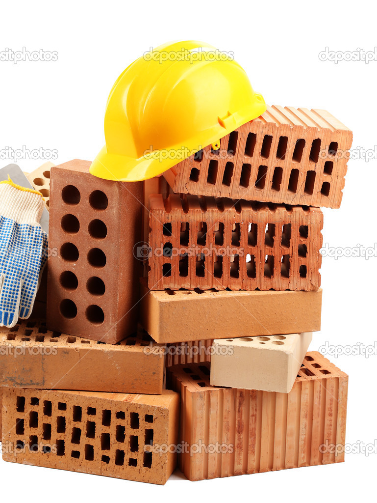 New bricks and building tools, isolated on white 