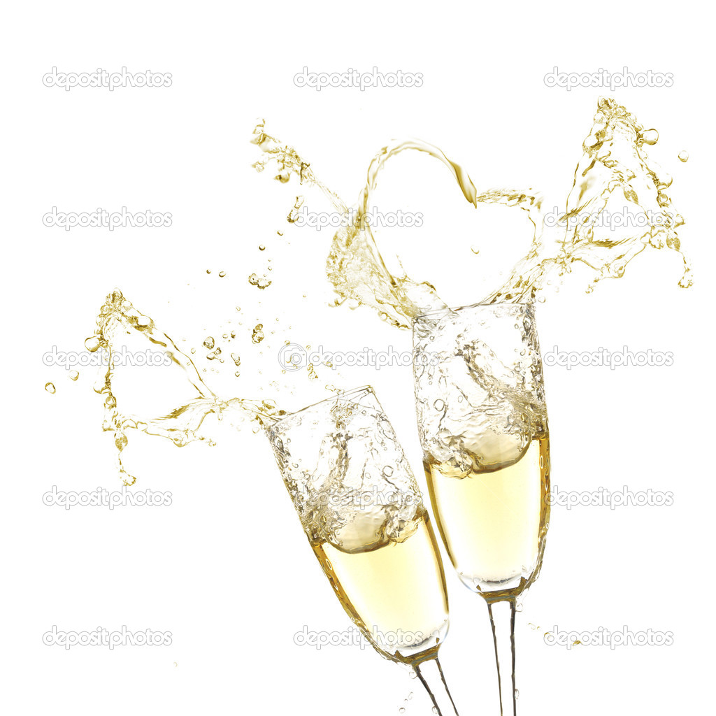 Glasses of champagne with splash, isolated on white