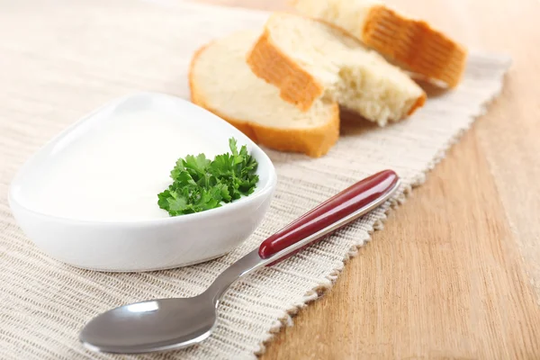 Bowl of creamy soup on table close up — Stock Photo, Image