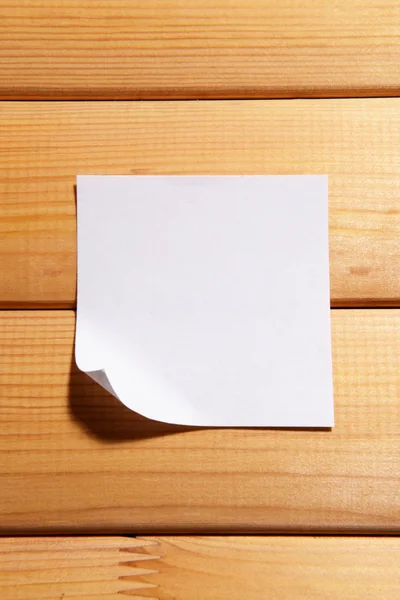 Empty paper sheet on wooden background — Stock Photo, Image