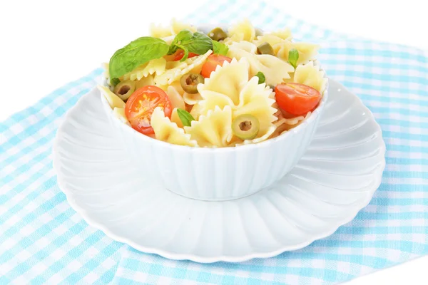 Delicious pasta with tomatoes on plate on table close-up — Stock Photo, Image