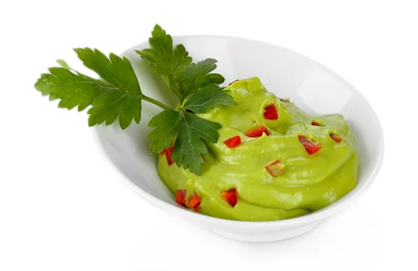 Fresh guacamole in bowl isolated on white — Stock Photo, Image
