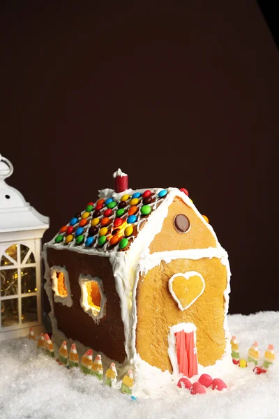 Gingerbread house on brown background — Stock Photo, Image