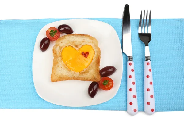 Scrambled eggs with bread on plate, on color napkin — Stock Photo, Image