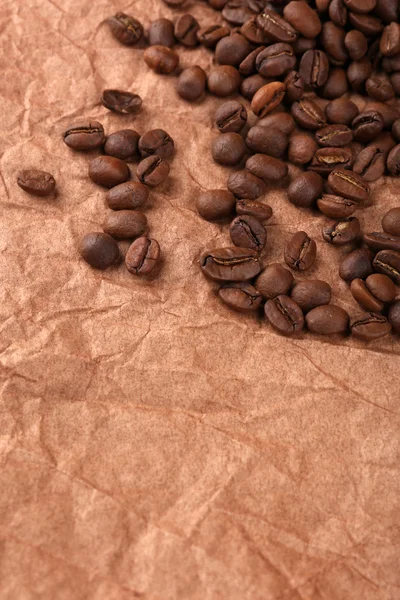 Grãos de café em close-up de mesa — Fotografia de Stock