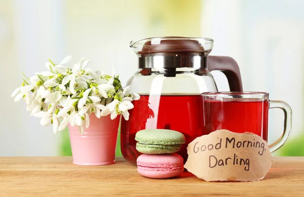 Tasty herbal tea and cookies on wooden table — Stock Photo, Image