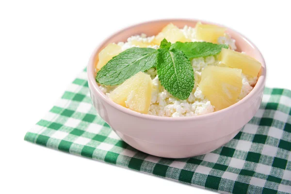 Bowl of tasty cottage cheese with pineapple, isolated on white — Stock Photo, Image