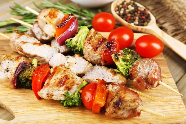 Pork kebab on wooden table close up — Stock Photo, Image