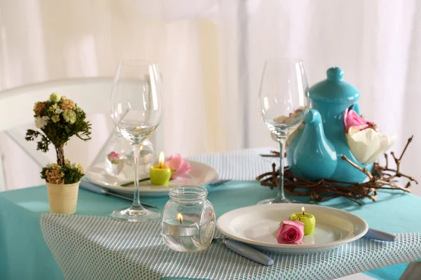 Beautiful holiday Easter table setting in blue tones, on light background — Stock Photo, Image