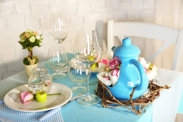 Beautiful holiday Easter table setting in blue tones, on light background — Stock Photo, Image