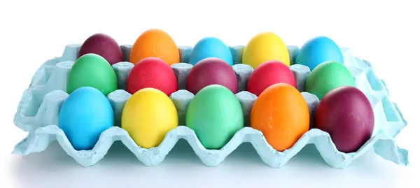 Ovos de Páscoa coloridos em bandeja isolados em branco — Fotografia de Stock