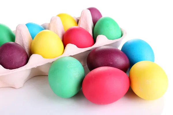 Colorful Easter eggs in tray isolated on white — Stock Photo, Image