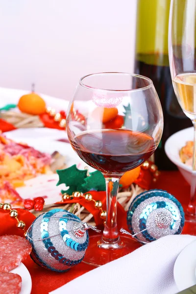 Table with festive dishes after feast close-up — Stock Photo, Image