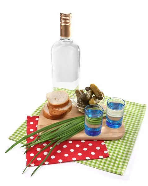 Composition with bottle of vodka and marinated mushrooms, cucumbers on wooden board isolated on white — Stock Photo, Image