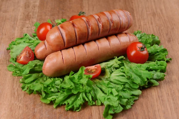 Grilled sausage on table close-up — Stock Photo, Image