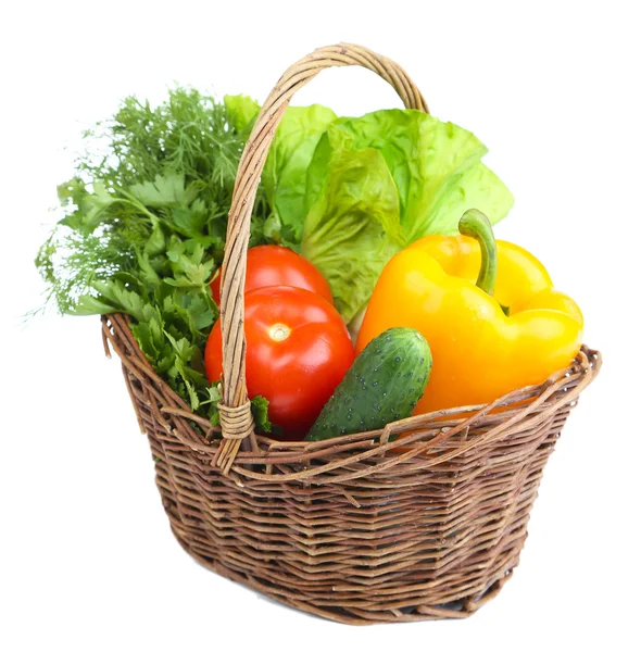 Composition with raw vegetables in wicker basket isolated on white — Stock Photo, Image