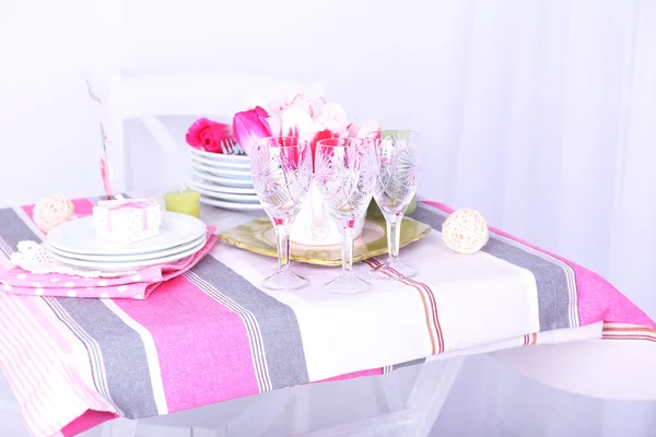 Beautiful spring table setting on light background — Stock Photo, Image