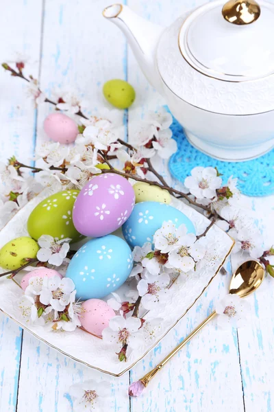 Easter composition with flowering branches on wooden table close-up — Stock Photo, Image