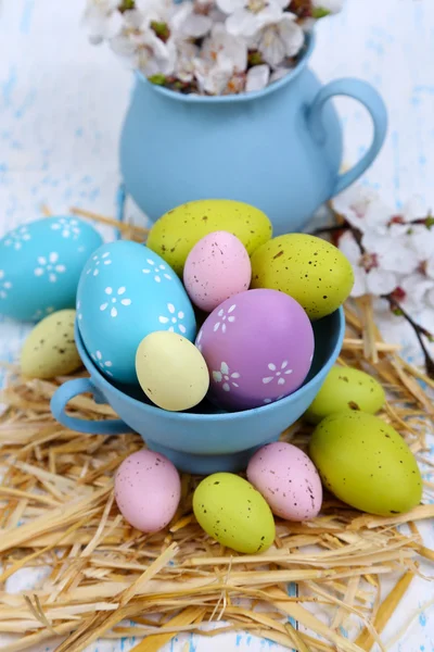 Easter composition with flowering branches on wooden table close-up — Stock Photo, Image